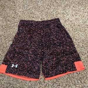 Boys under amour shorts in size large.